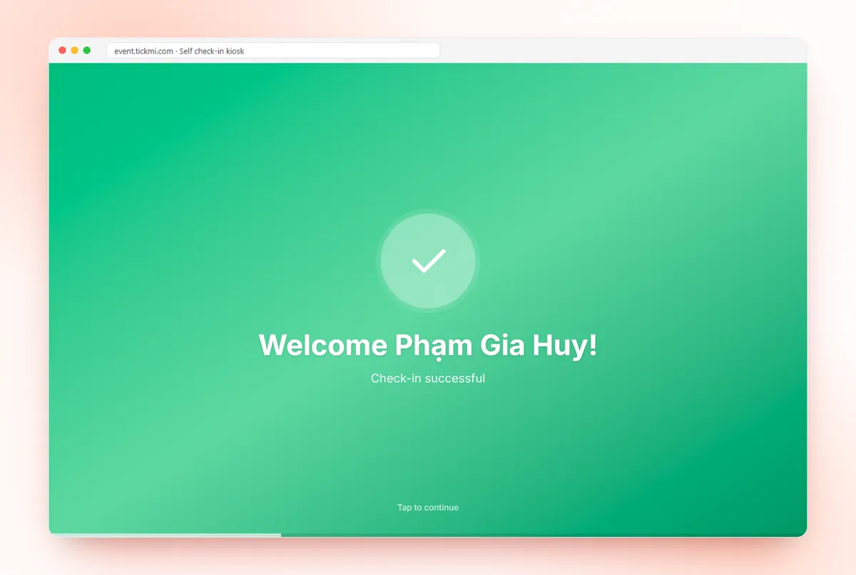 Self check-in kiosk confirming success and greeting the attendee